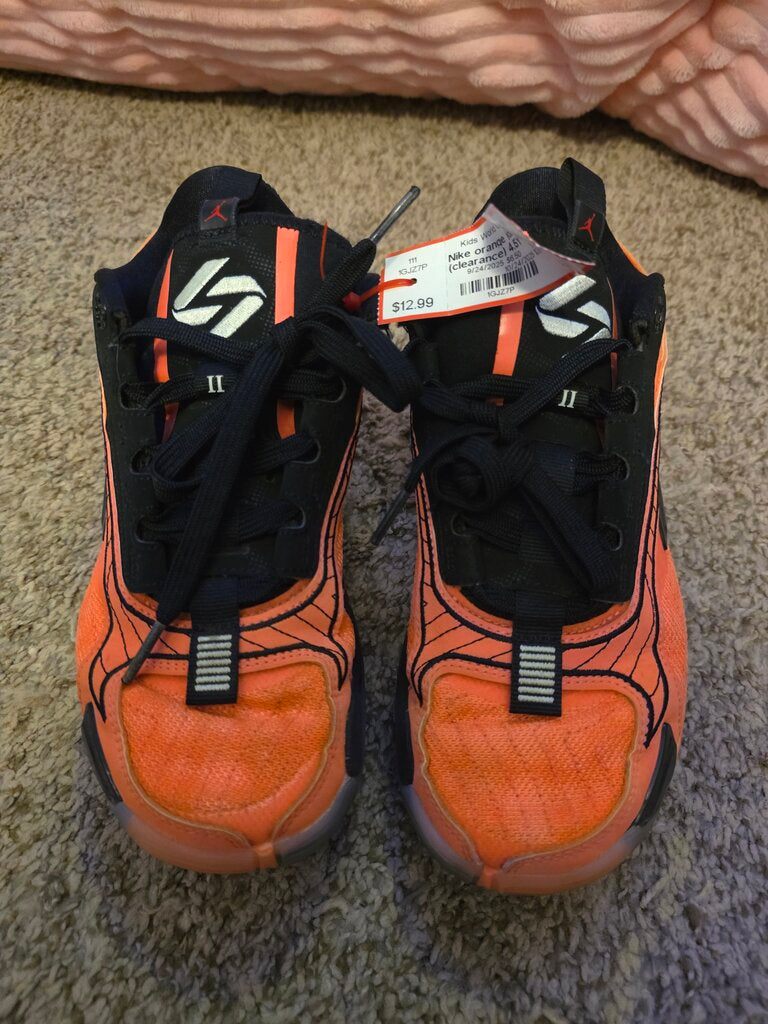 orange jordans (clearance) size 4.5Y